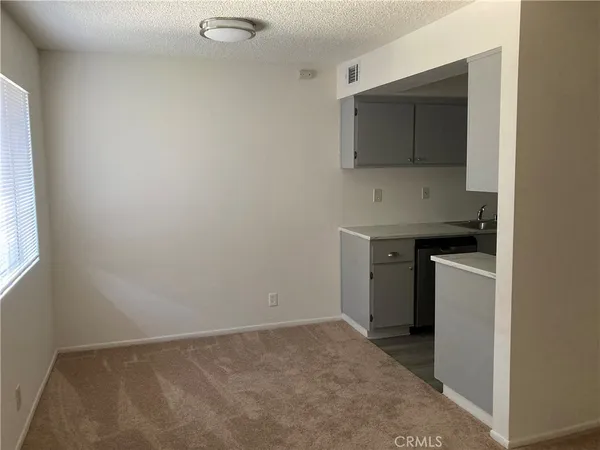 a utility room with a sink a washer and dryer