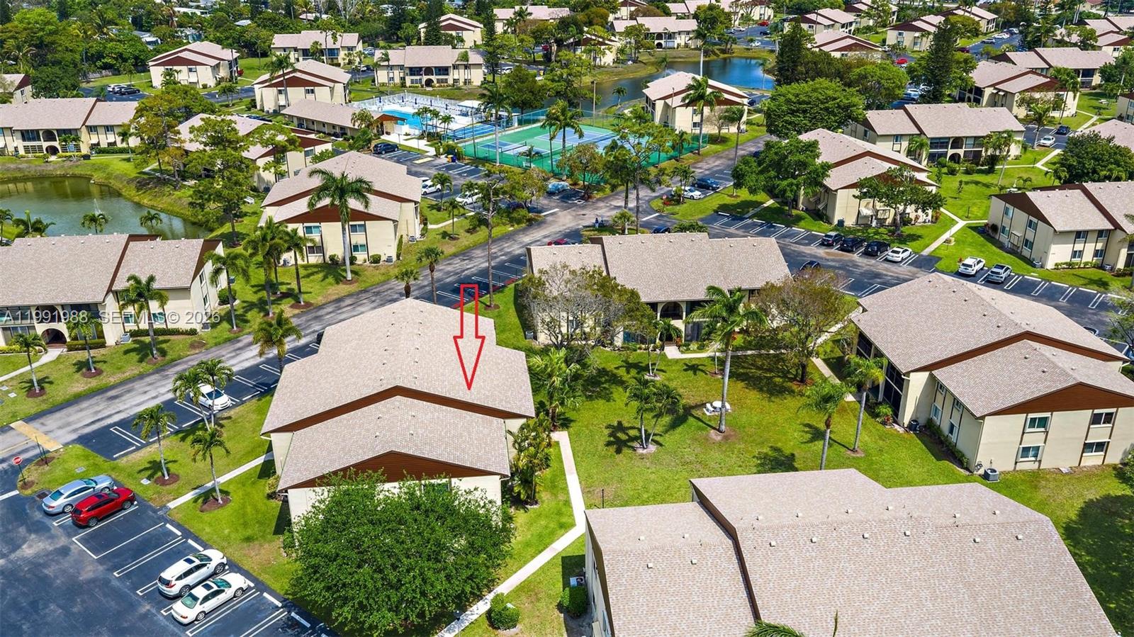 301 Pine Ridge Circle, Unit C1 Greenacres, FL 33463 - Photo 28 of 30 an aerial view of residential houses with outdoor space and street view