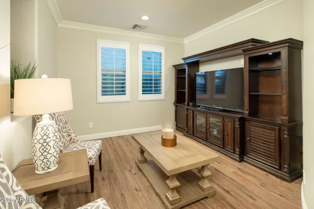 a view of a patio with a table chairs and a patio