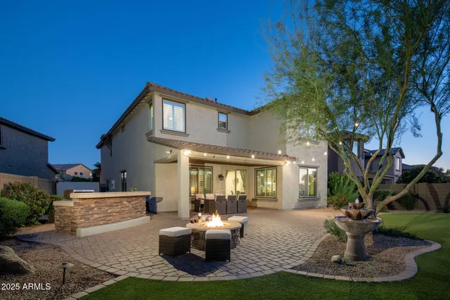 a view of barbeque grill with granite counter top