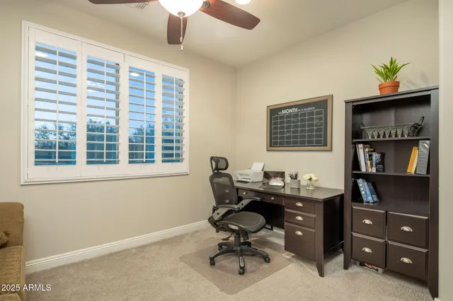 a large kitchen with a large window and a sink