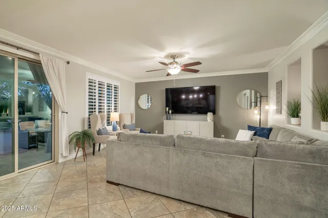 a kitchen with kitchen island granite countertop a sink a center island and cabinets