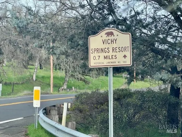 a sign on the side of the road