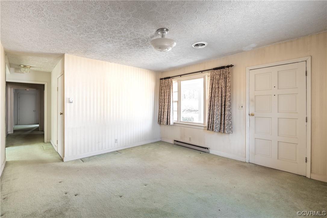 1976 Tuggle Road Farmville, VA 23901 - Photo 4 of 33 an empty room with windows and closet