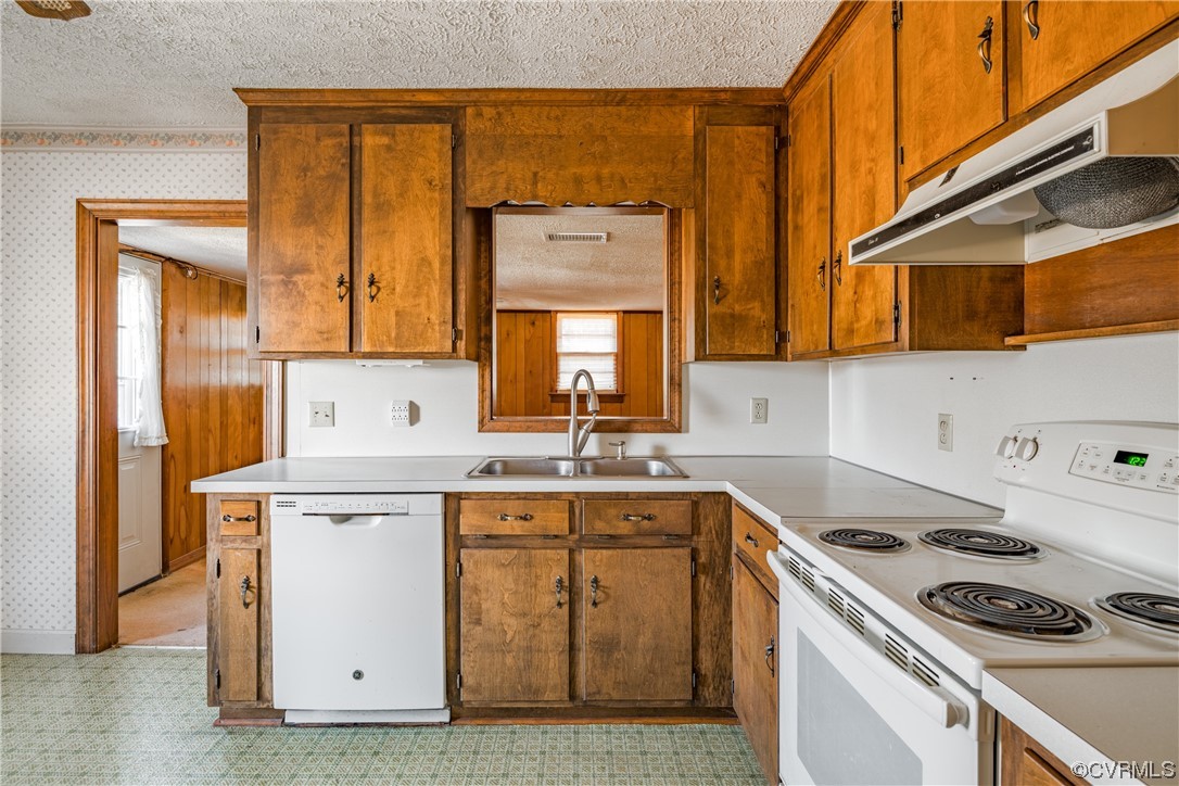 1976 Tuggle Road Farmville, VA 23901 - Photo 9 of 33 a kitchen with a sink stove and cabinets
