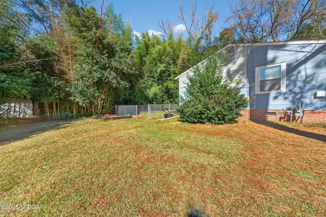 a house view with a outdoor space