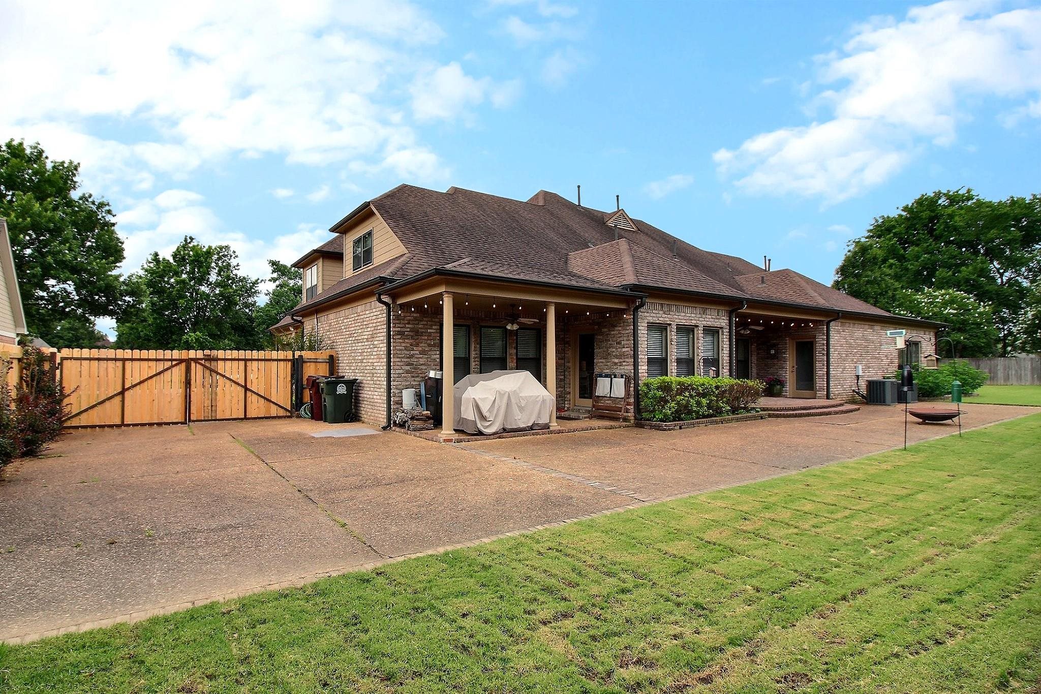 1156 Sunriver Cove Collierville, TN 38017 - Photo 29 of 37 a view of a house with backyard and porch