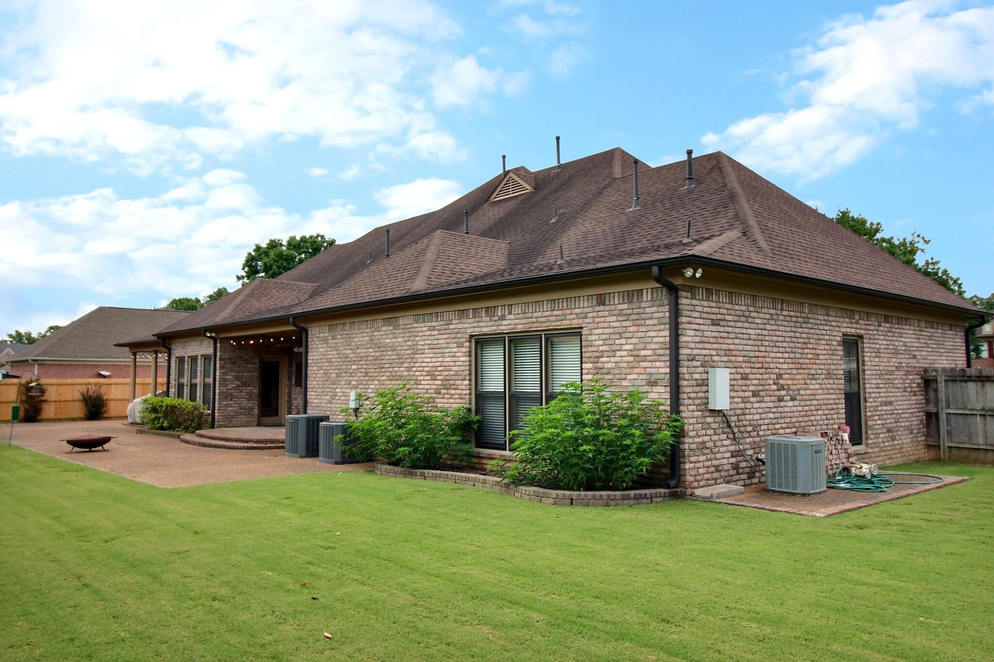 1156 Sunriver Cove Collierville, TN 38017 - Photo 34 of 37 a house view with a garden space