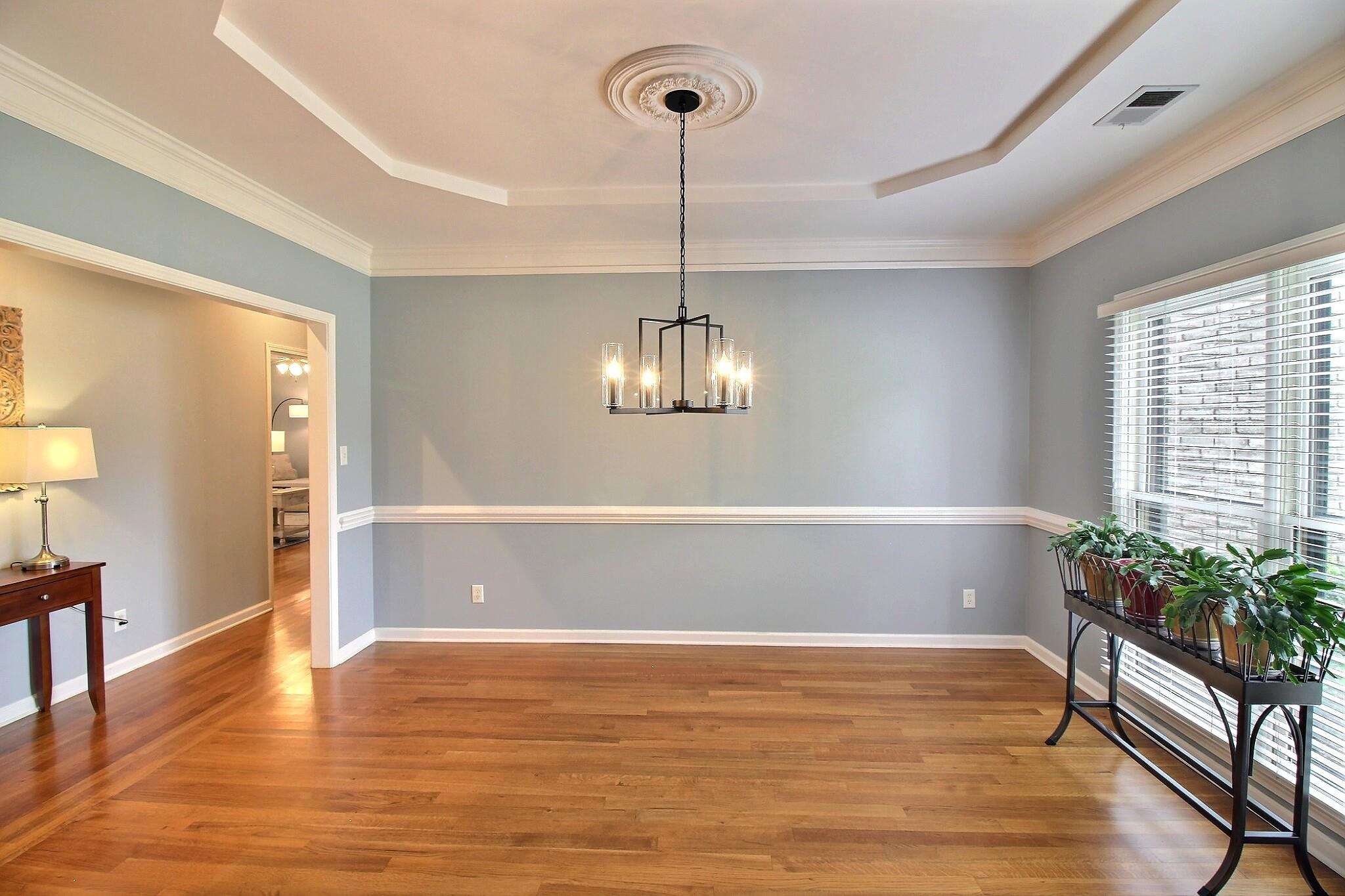1156 Sunriver Cove Collierville, TN 38017 - Photo 5 of 37 a view of empty room with wooden floor and fan