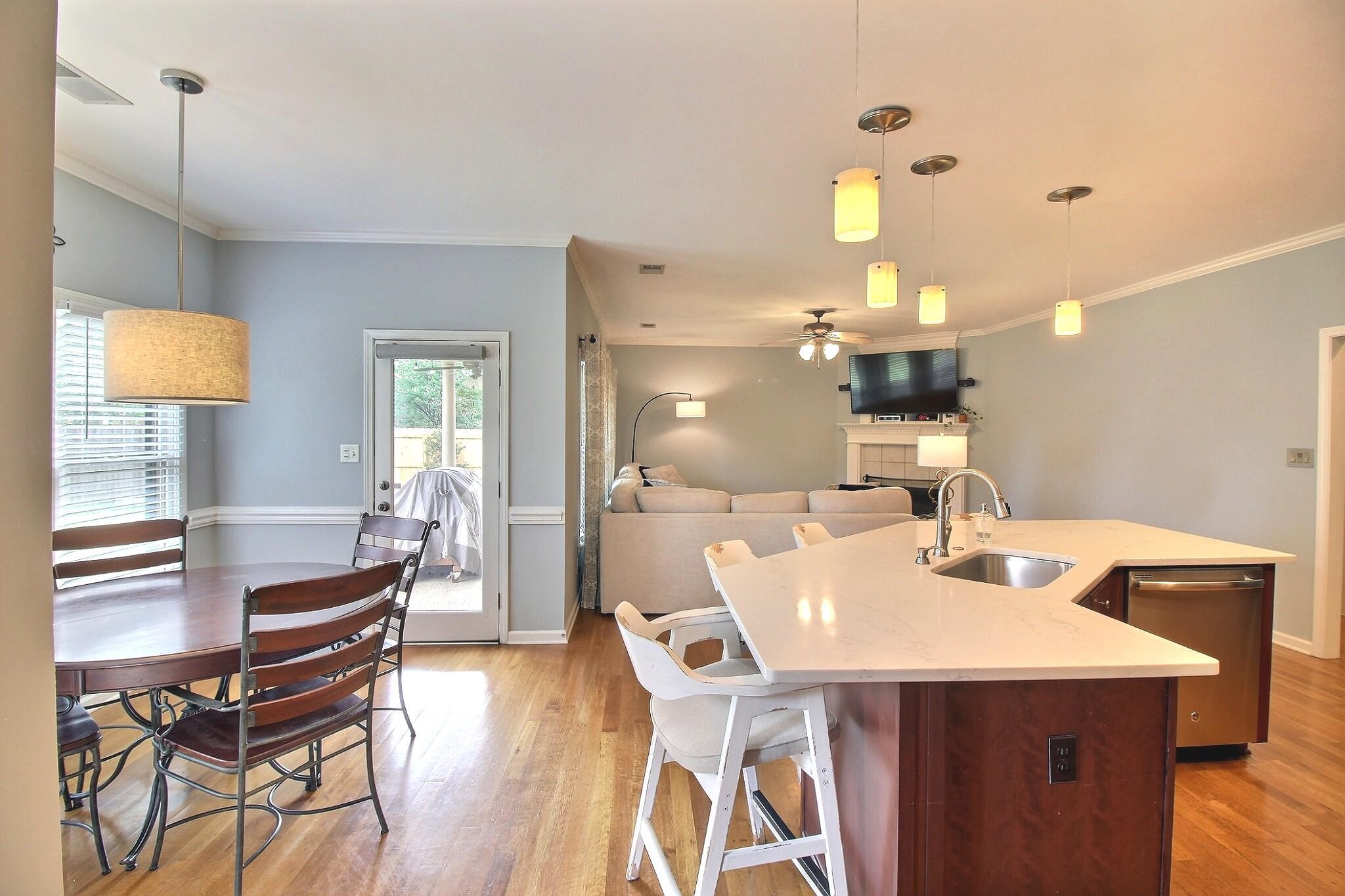 1156 Sunriver Cove Collierville, TN 38017 - Photo 10 of 37 a kitchen with a table chairs and entryway