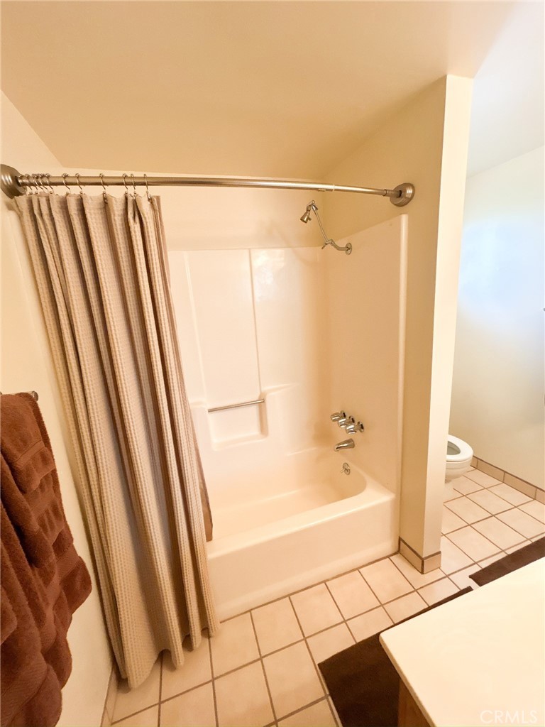 2153 Florence Boulevard Blythe, CA 92225 - Photo 15 of 38 a bathroom with a bathtub and a shower