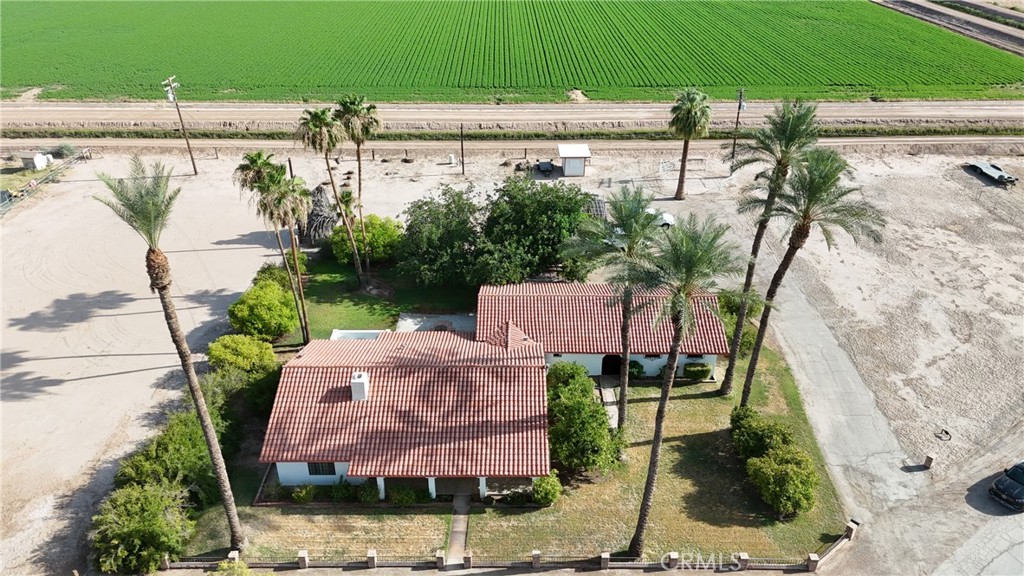 2153 Florence Boulevard Blythe, CA 92225 - Photo 2 of 38 a aerial view of a house with a yard and potted plants