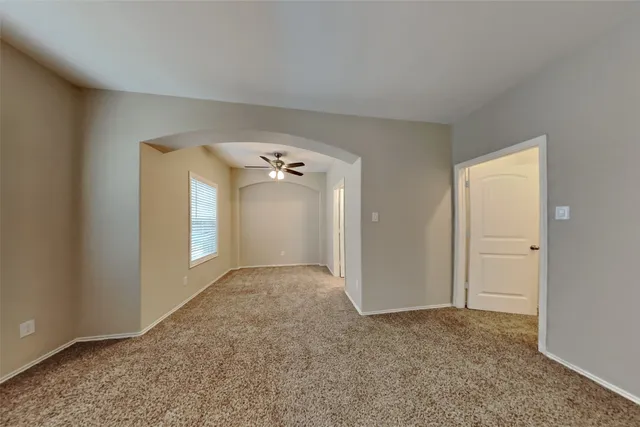 a bathroom with a tub and a shower