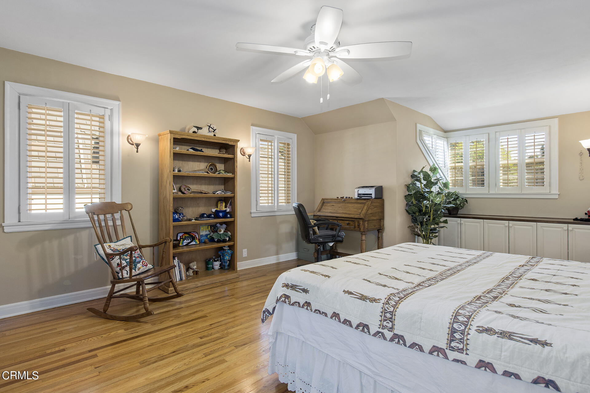3320 Yorkshire Road Pasadena, CA 91107 - Photo 18 of 26 a bedroom with a bed a table and chair