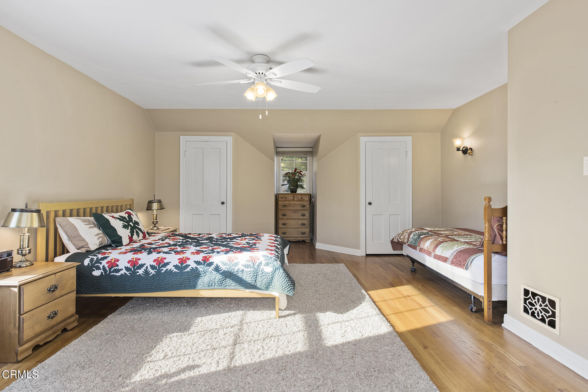 3320 Yorkshire Road Pasadena, CA 91107 - Photo 19 of 26 a bedroom with a bed and ceiling fan