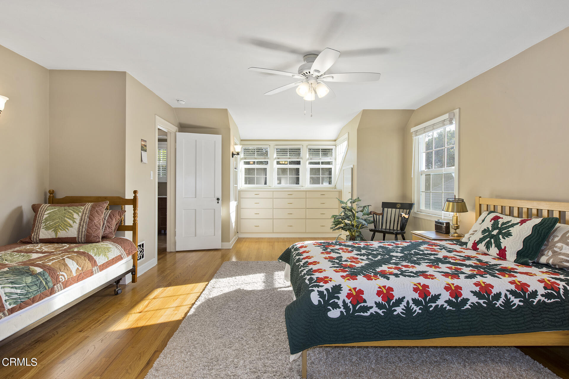 3320 Yorkshire Road Pasadena, CA 91107 - Photo 20 of 26 a bedroom with a large bed and a chandelier