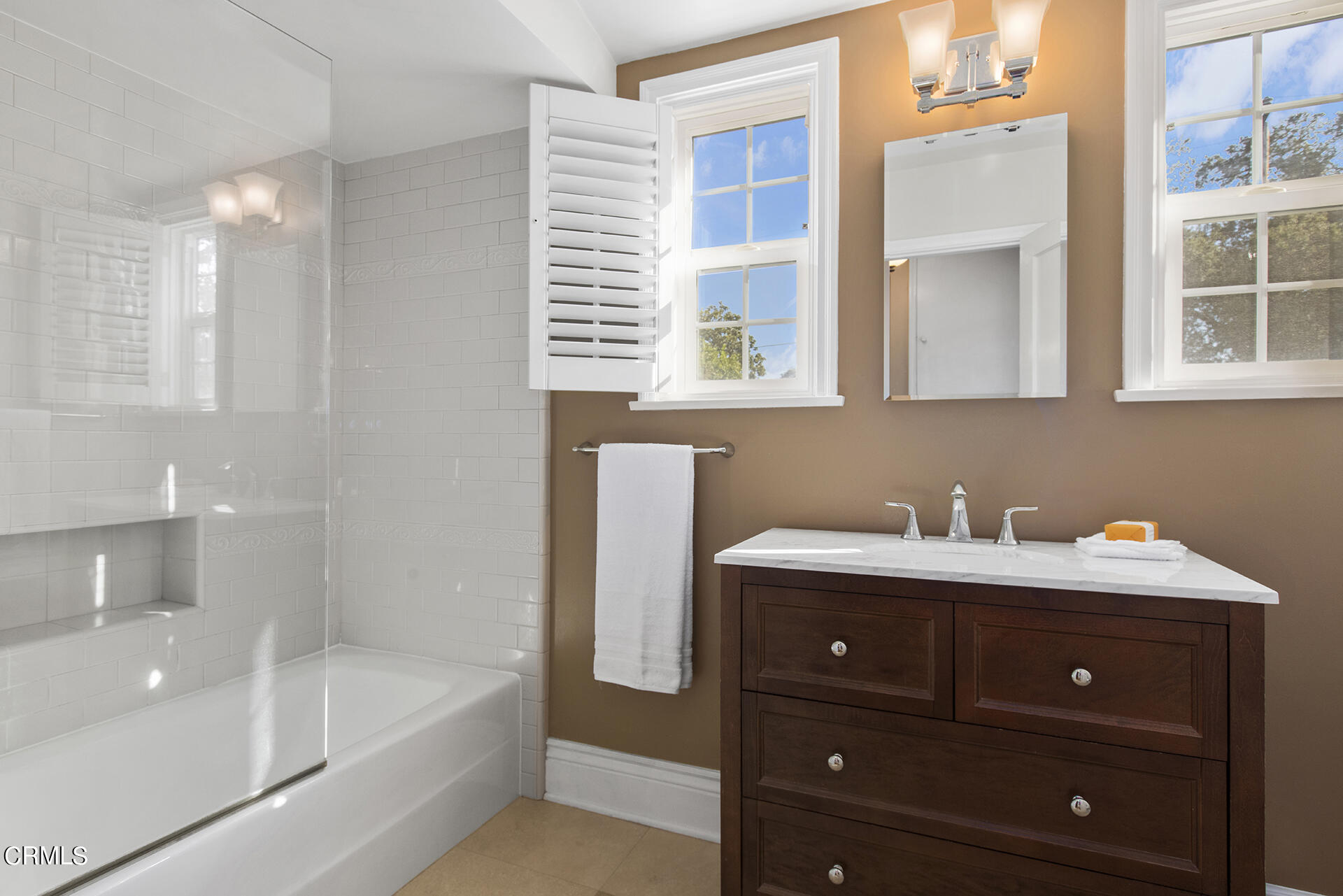 3320 Yorkshire Road Pasadena, CA 91107 - Photo 21 of 26 a bathroom with a sink double vanity and bathtub