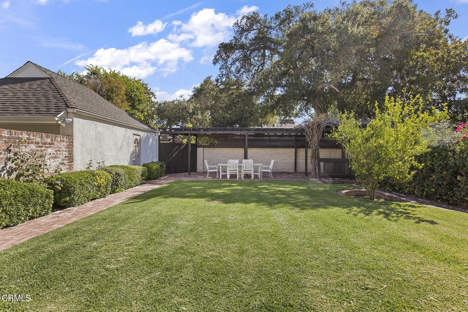 3320 Yorkshire Road Pasadena, CA 91107 - Photo 23 of 26 a view of a house with backyard and sitting area