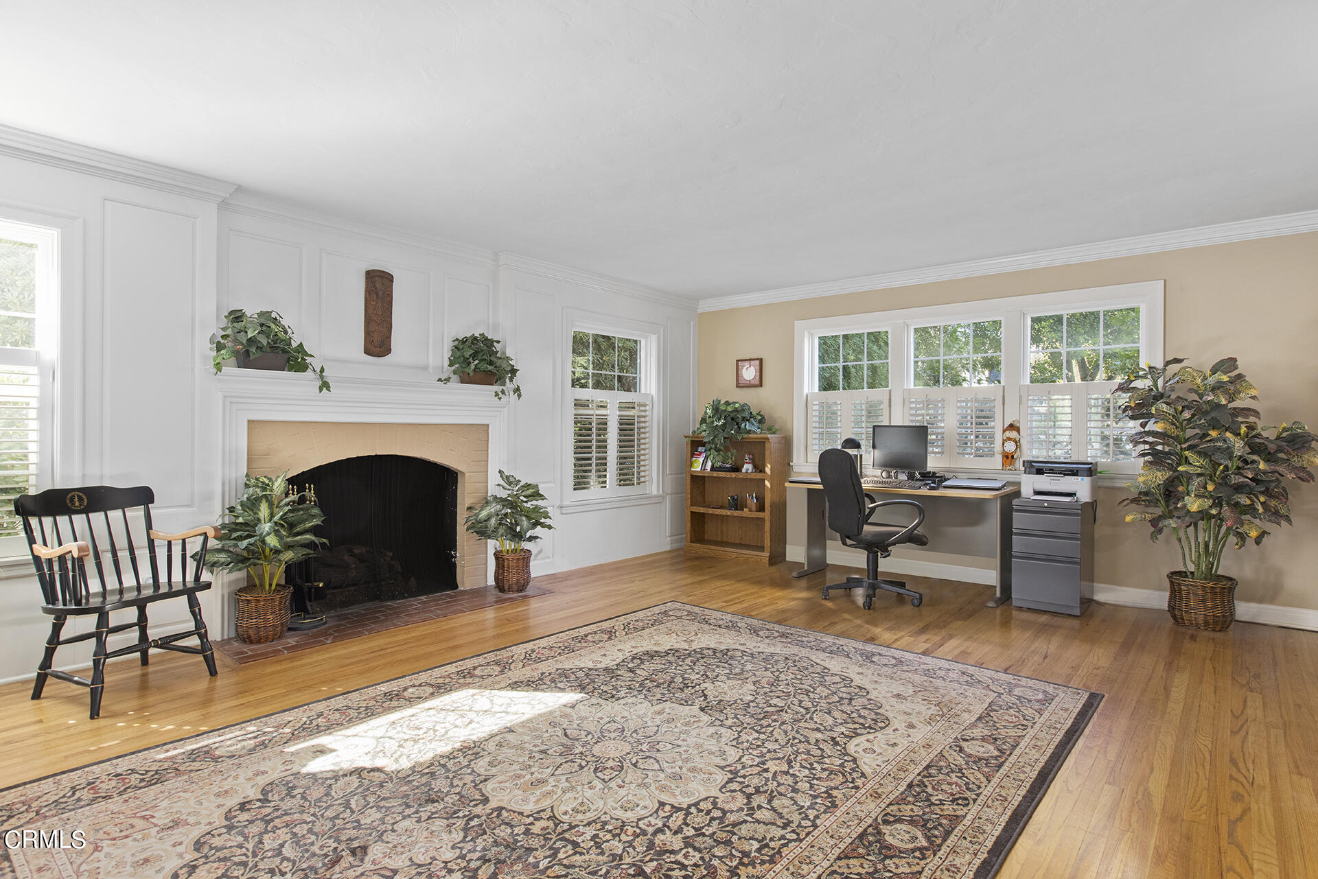 3320 Yorkshire Road Pasadena, CA 91107 - Photo 7 of 26 a living room with furniture and a fireplace