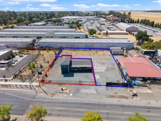 an aerial view of a pool table and chairs