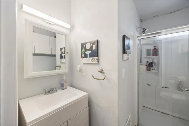 a bed room with furniture and a window