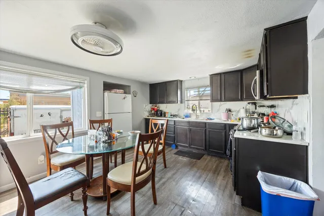 a view of a chairs and tables in the patio