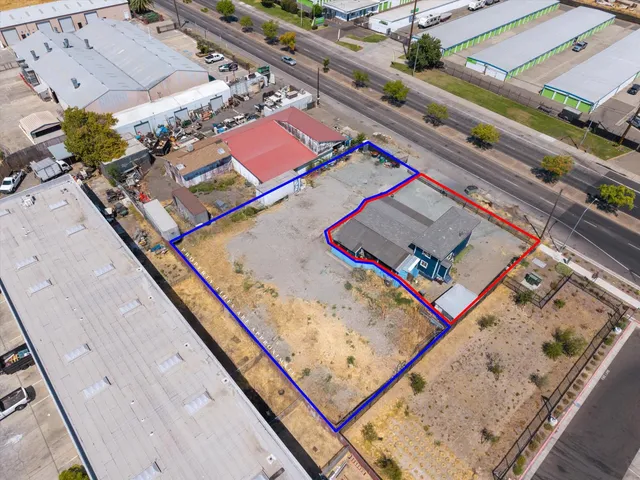 an aerial view of a swimming pool and mountain view