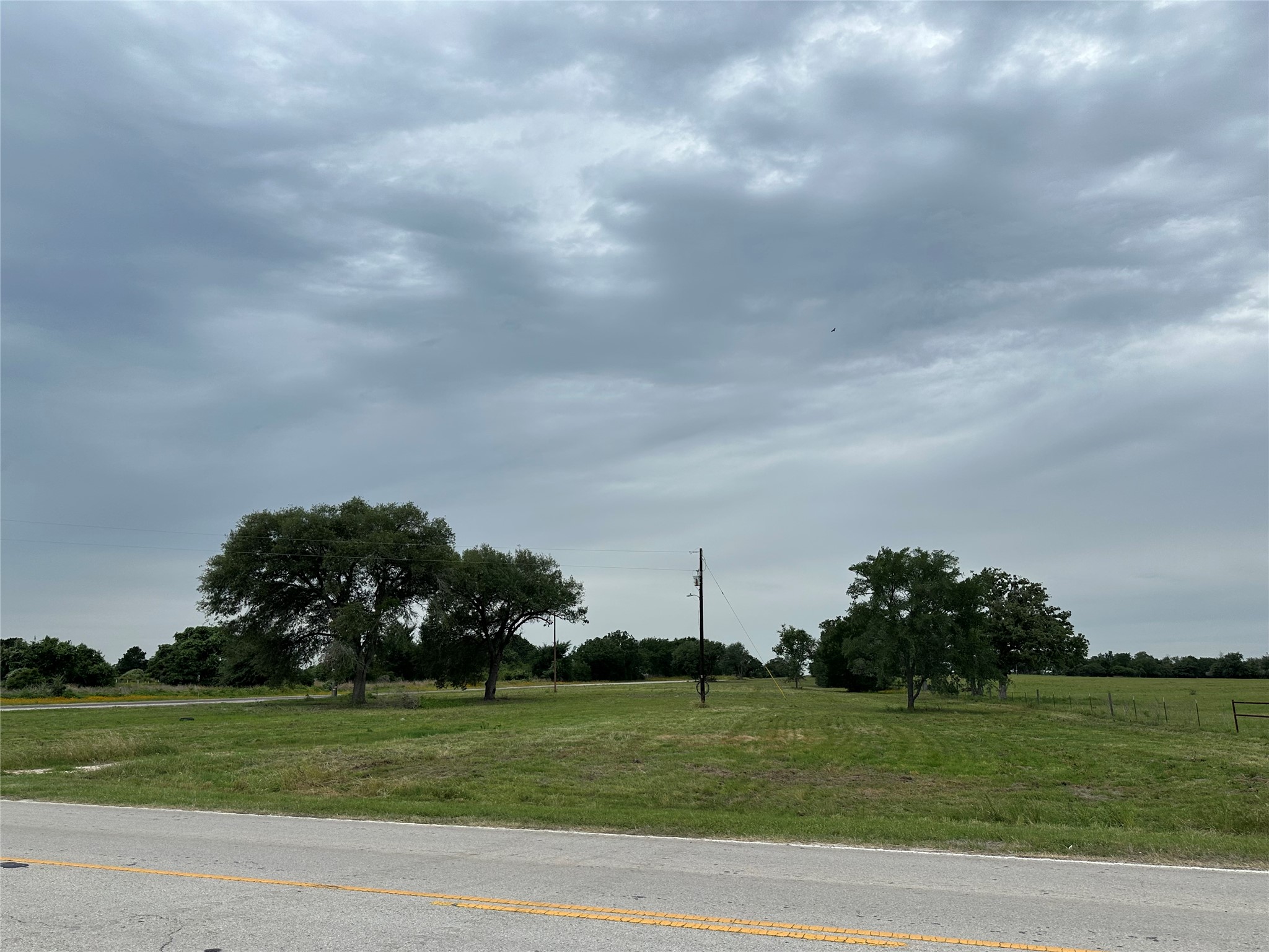 4903 FM 180 Road Ledbetter, TX 78946 - Photo 6 of 7 a view of a golf course with a garden