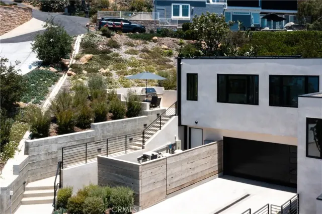 a view of city from balcony with seating space