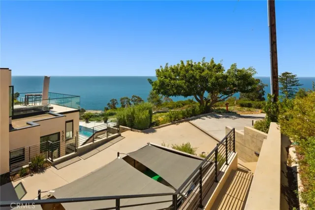 a view of a patio with swimming pool