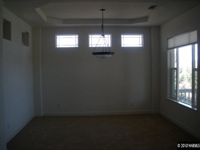 5802 North White Sands Road Reno, NV 89511 - Photo 4 of 9 a view of empty room with windows