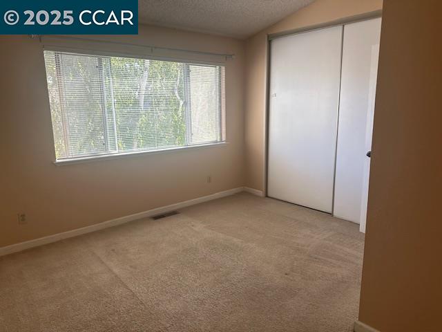 2723 Oak Road, Unit K Walnut Creek, CA 94597 - Photo 10 of 15 an empty room with a window