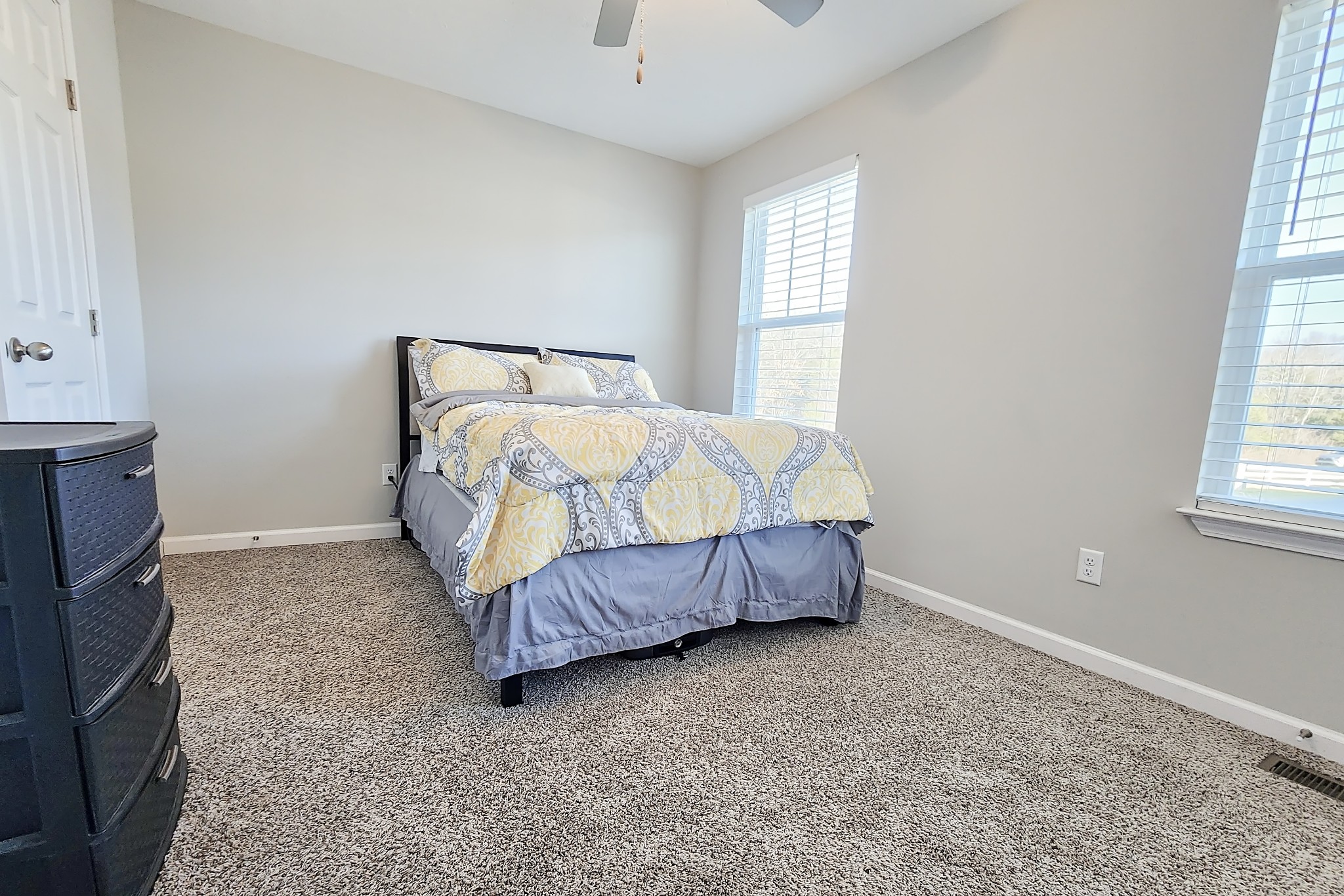 1382 Rural Hill Road, Unit 304 Antioch, TN 37013 - Photo 13 of 21 a bed sitting in a spacious bedroom next to a window