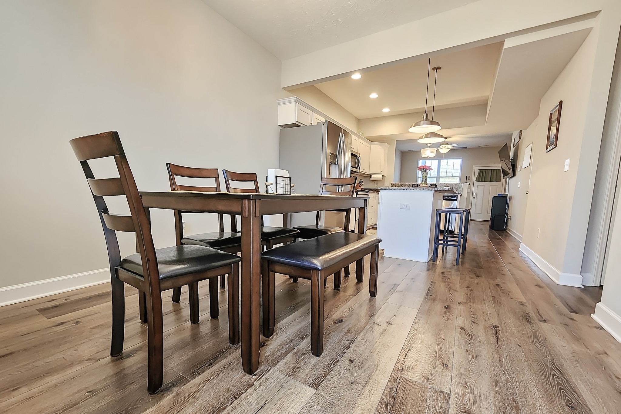 1382 Rural Hill Road, Unit 304 Antioch, TN 37013 - Photo 6 of 21 a dining room with furniture and wooden floor