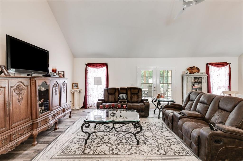 144 Bobs Drive Mableton, GA 30126 - Photo 14 of 33 a living room with furniture and a flat screen tv
