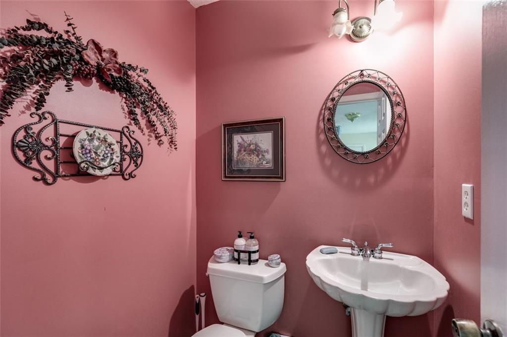 144 Bobs Drive Mableton, GA 30126 - Photo 23 of 33 a bathroom with a sink mirror and vanity