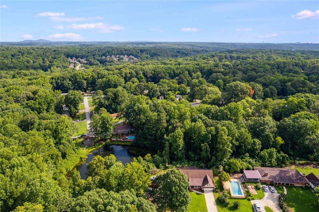 144 Bobs Drive Mableton, GA 30126 - Photo 28 of 33 an aerial view of a houses with a yard and lake view