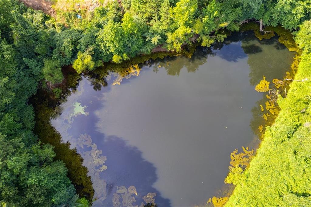 144 Bobs Drive Mableton, GA 30126 - Photo 31 of 33 an aerial view of a house with a yard and lake view