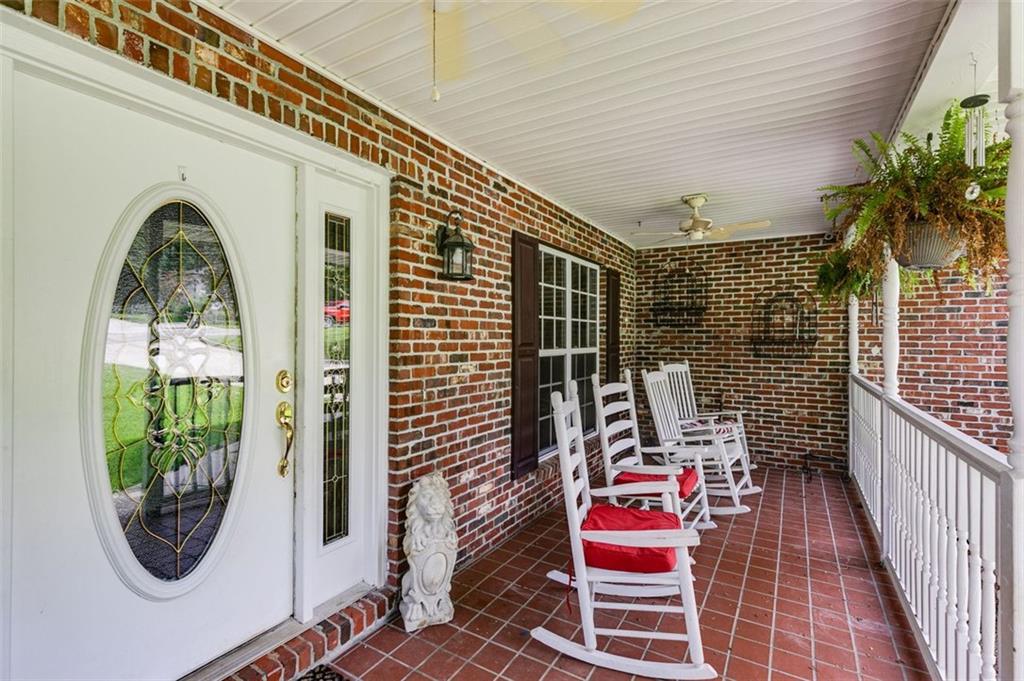 144 Bobs Drive Mableton, GA 30126 - Photo 4 of 33 a front view of a house with large windows
