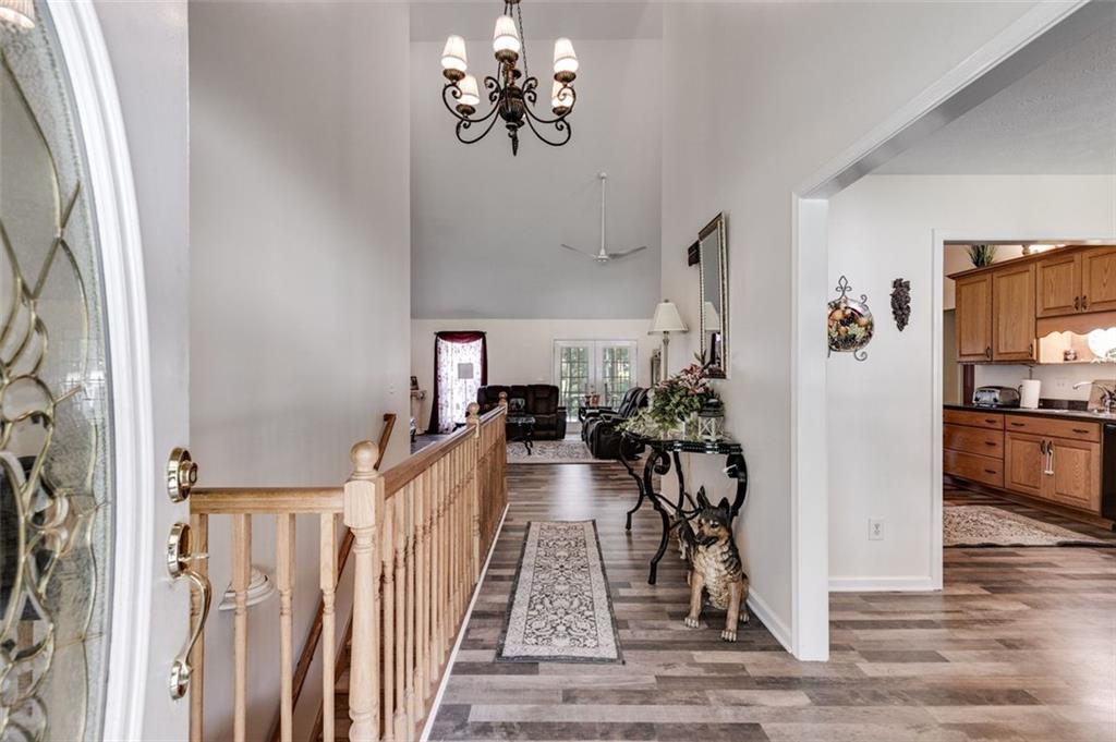 144 Bobs Drive Mableton, GA 30126 - Photo 5 of 33 a view of a livingroom with furniture and a floor to ceiling window