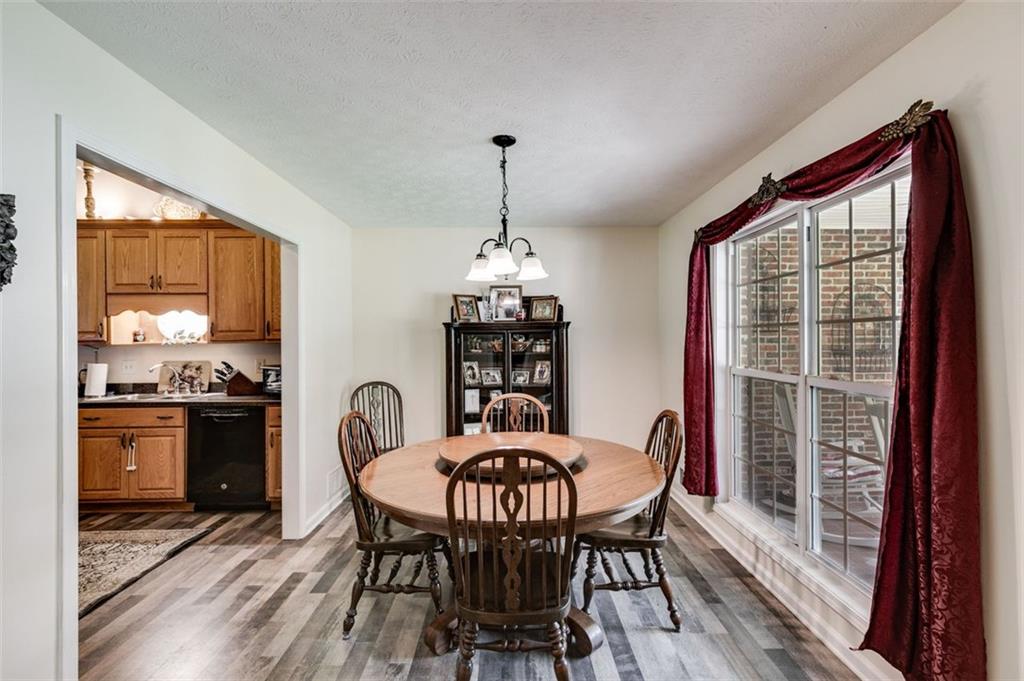 144 Bobs Drive Mableton, GA 30126 - Photo 10 of 33 a view of a dining room with furniture window and outside view