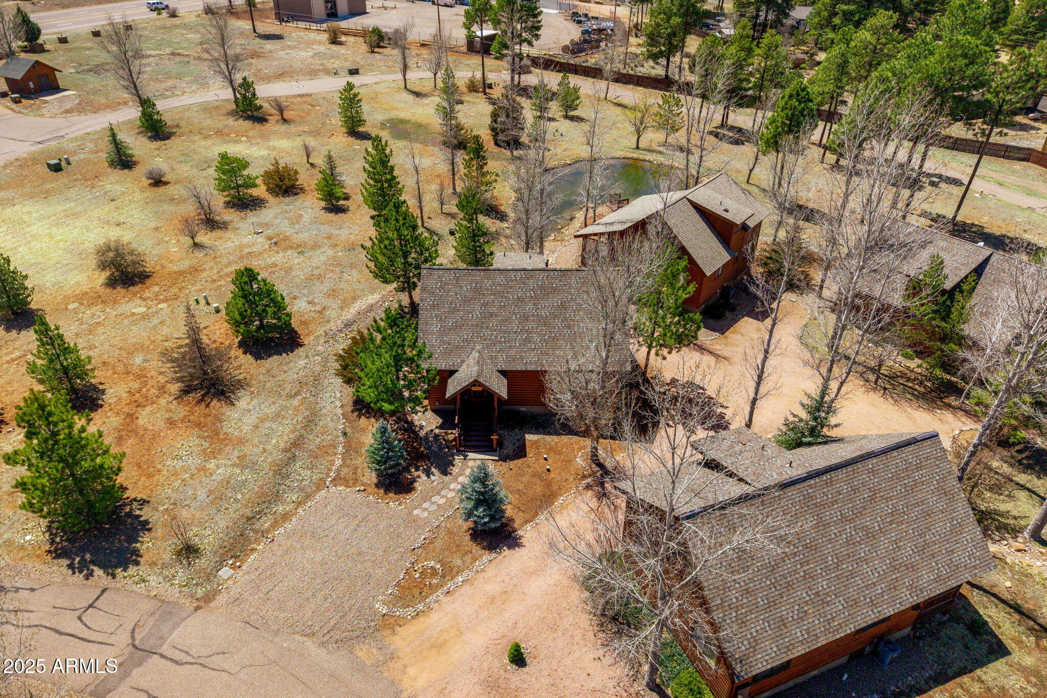 2300 Overgaard Springs Loop Overgaard, AZ 85933 - Photo 11 of 48 an aerial view of a house with a yard and sitting area