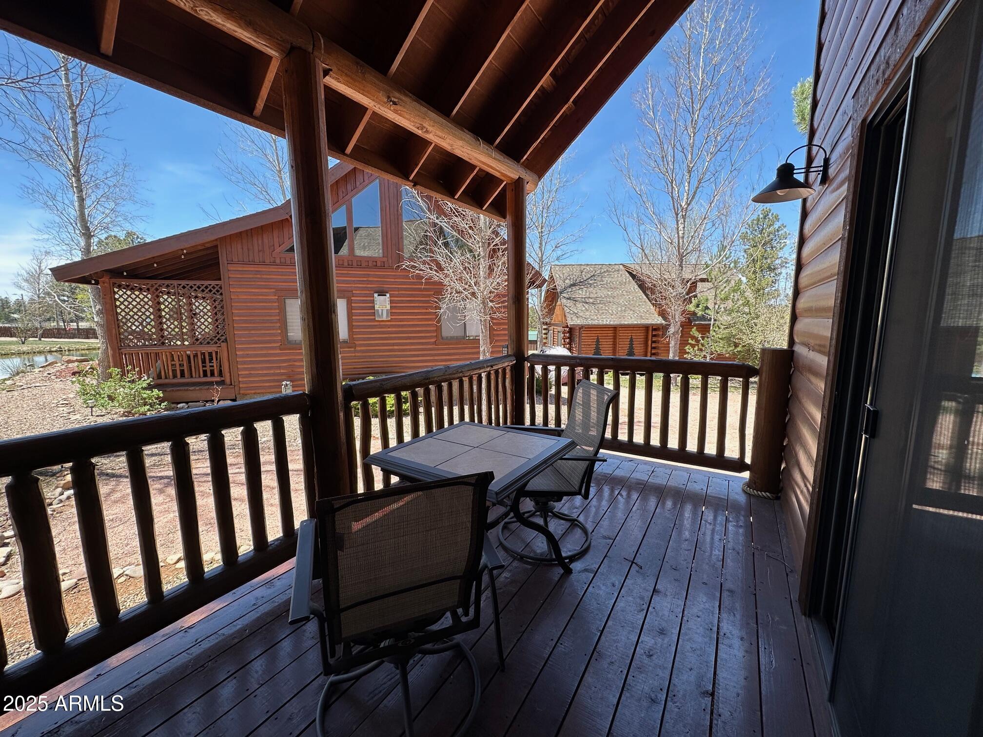 2300 Overgaard Springs Loop Overgaard, AZ 85933 - Photo 12 of 48 a view of a balcony with furniture