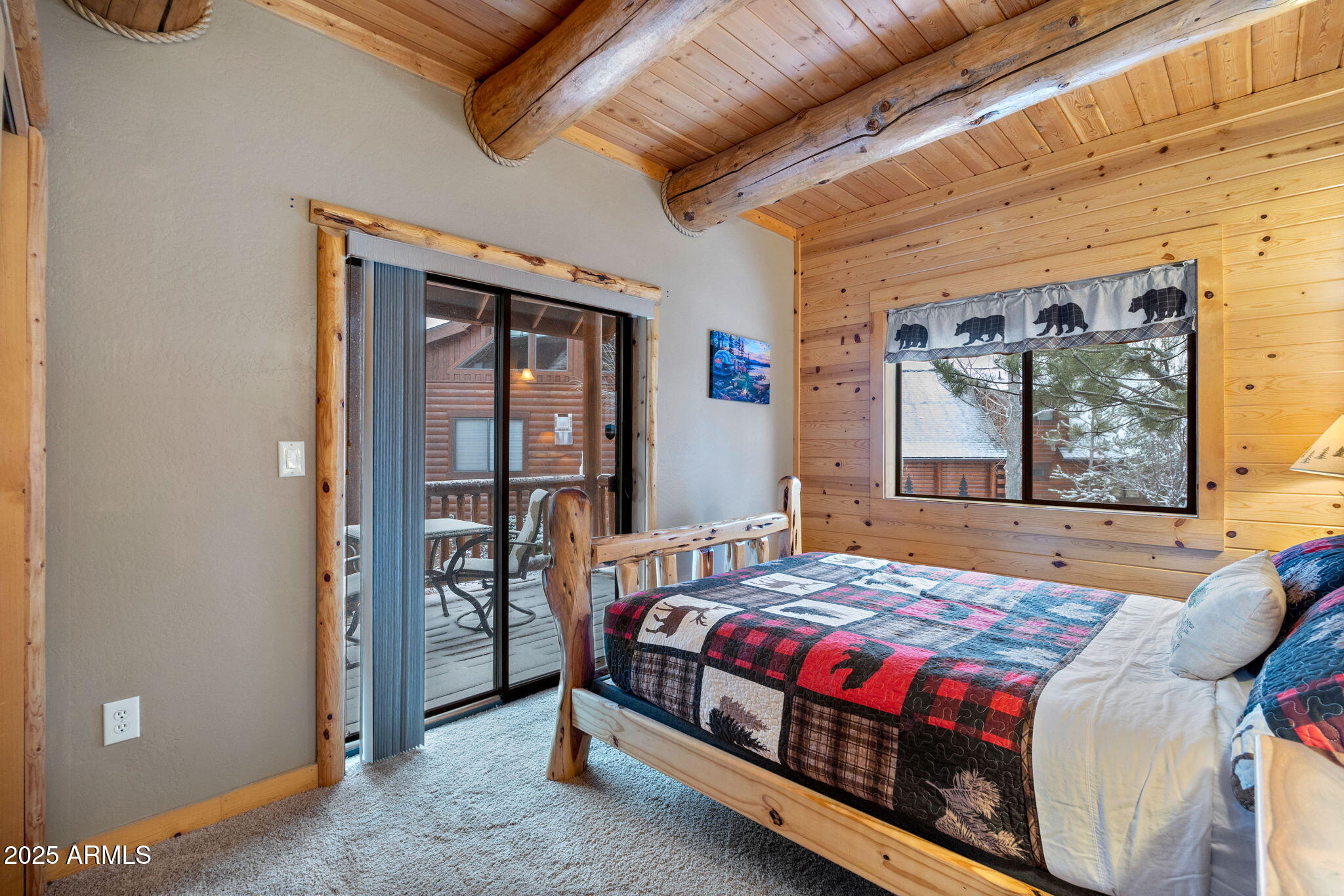 2300 Overgaard Springs Loop Overgaard, AZ 85933 - Photo 21 of 48 a bedroom with a bed and a window