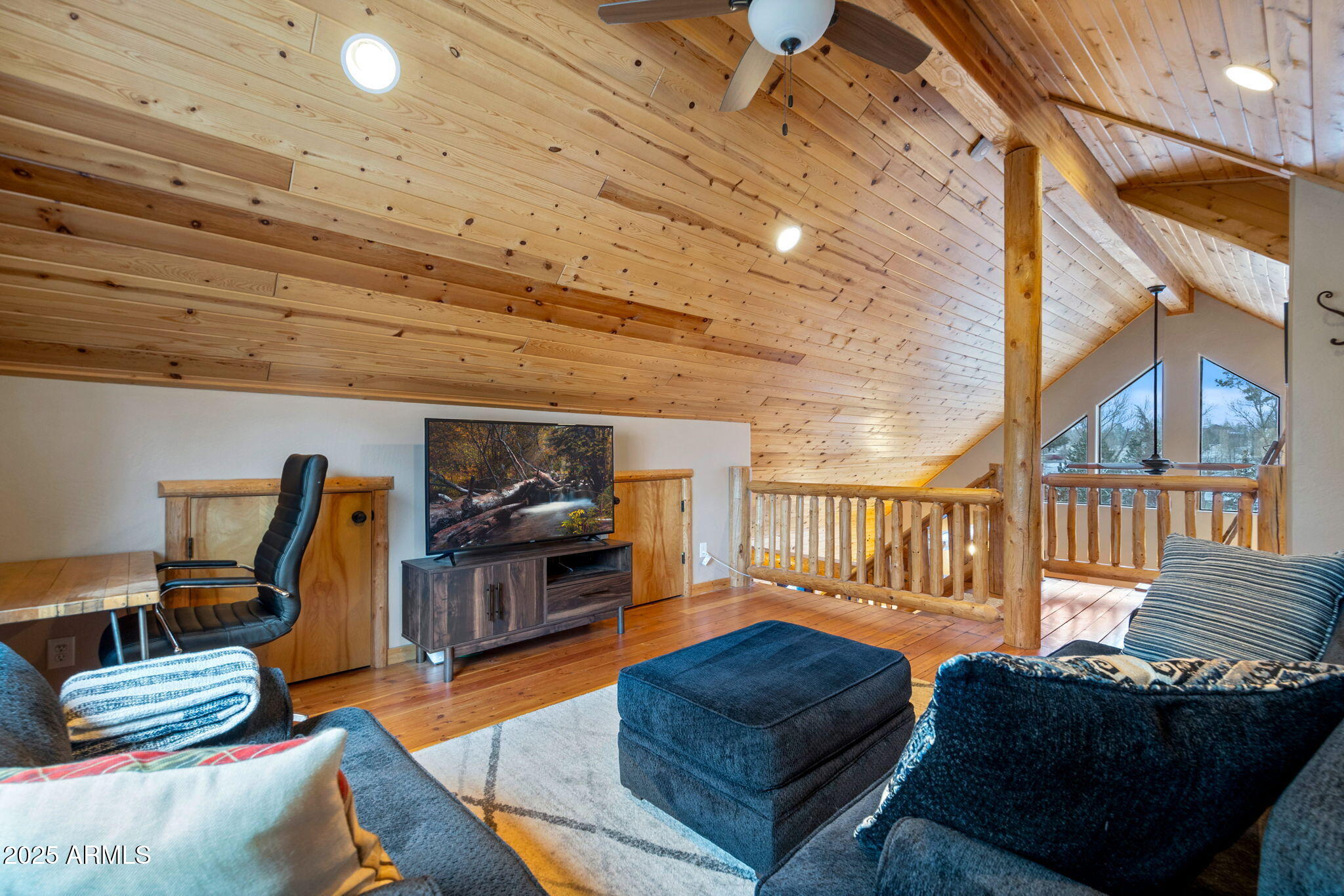 2300 Overgaard Springs Loop Overgaard, AZ 85933 - Photo 28 of 48 a living room with furniture a rug and a window
