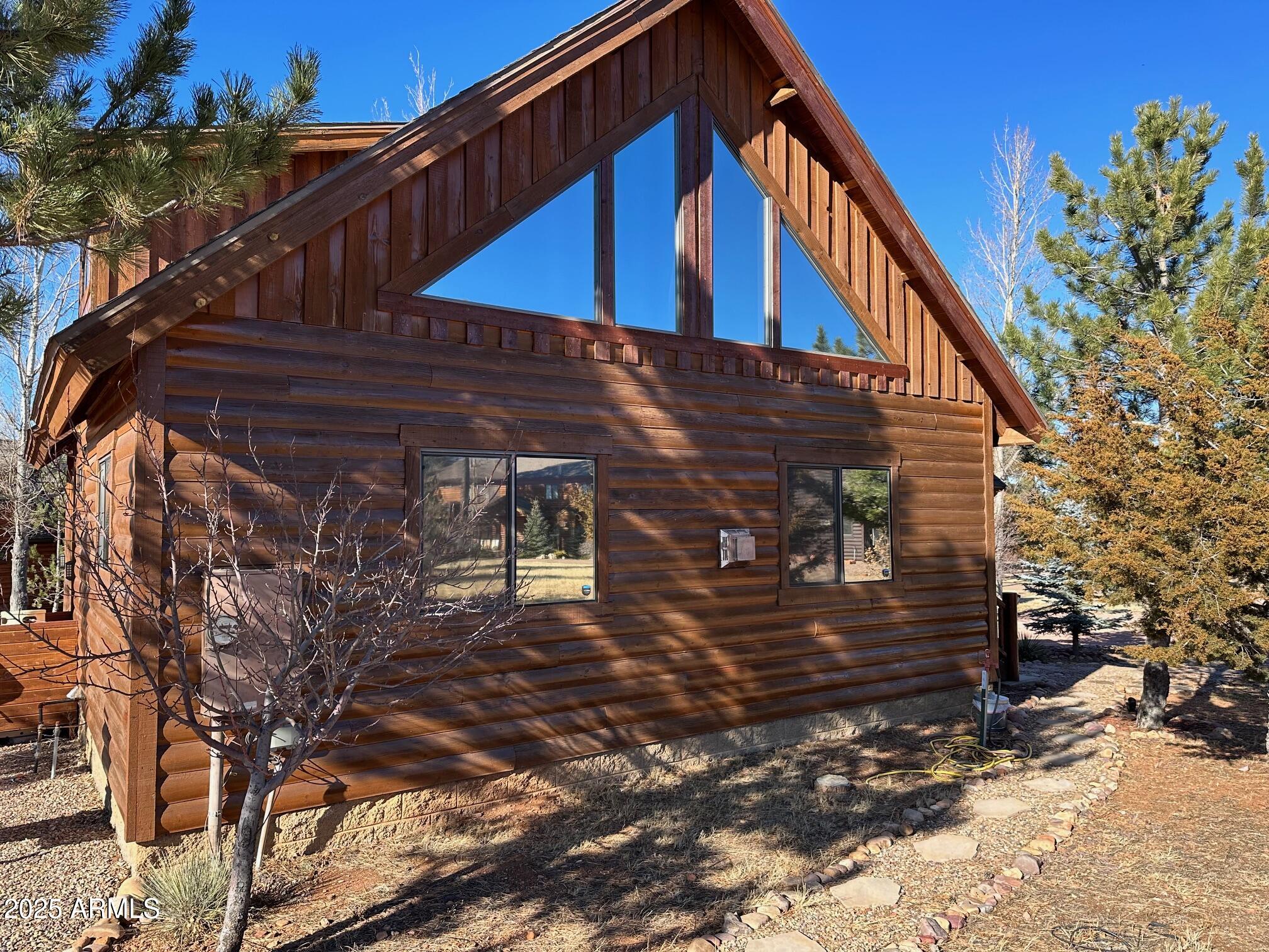 2300 Overgaard Springs Loop Overgaard, AZ 85933 - Photo 4 of 48 a view of a house with a yard