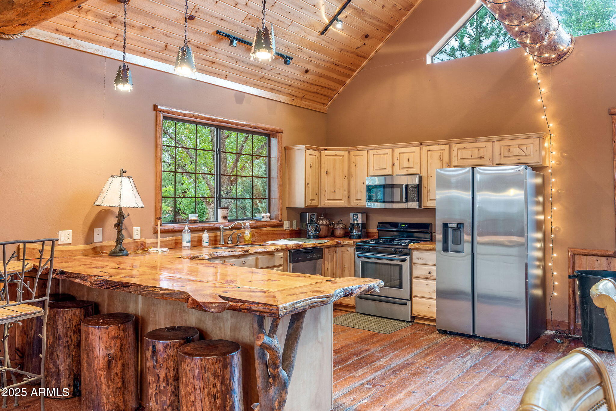 2300 Overgaard Springs Loop Overgaard, AZ 85933 - Photo 44 of 48 a kitchen with granite countertop a sink appliances a counter space and stainless steel appliances