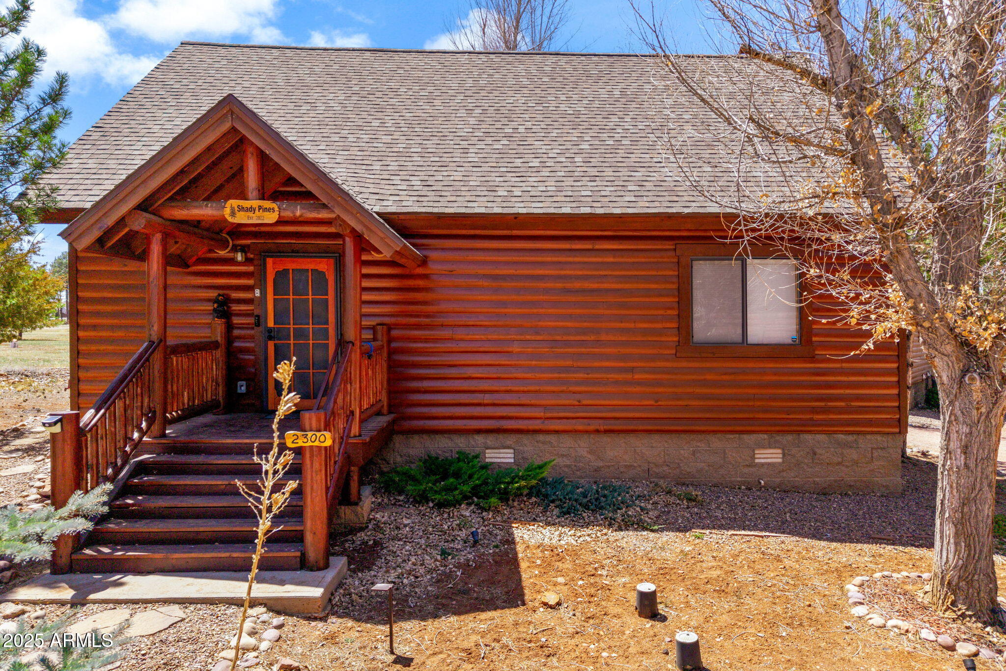 2300 Overgaard Springs Loop Overgaard, AZ 85933 - Photo 5 of 48 a front view of house with wooden stairs