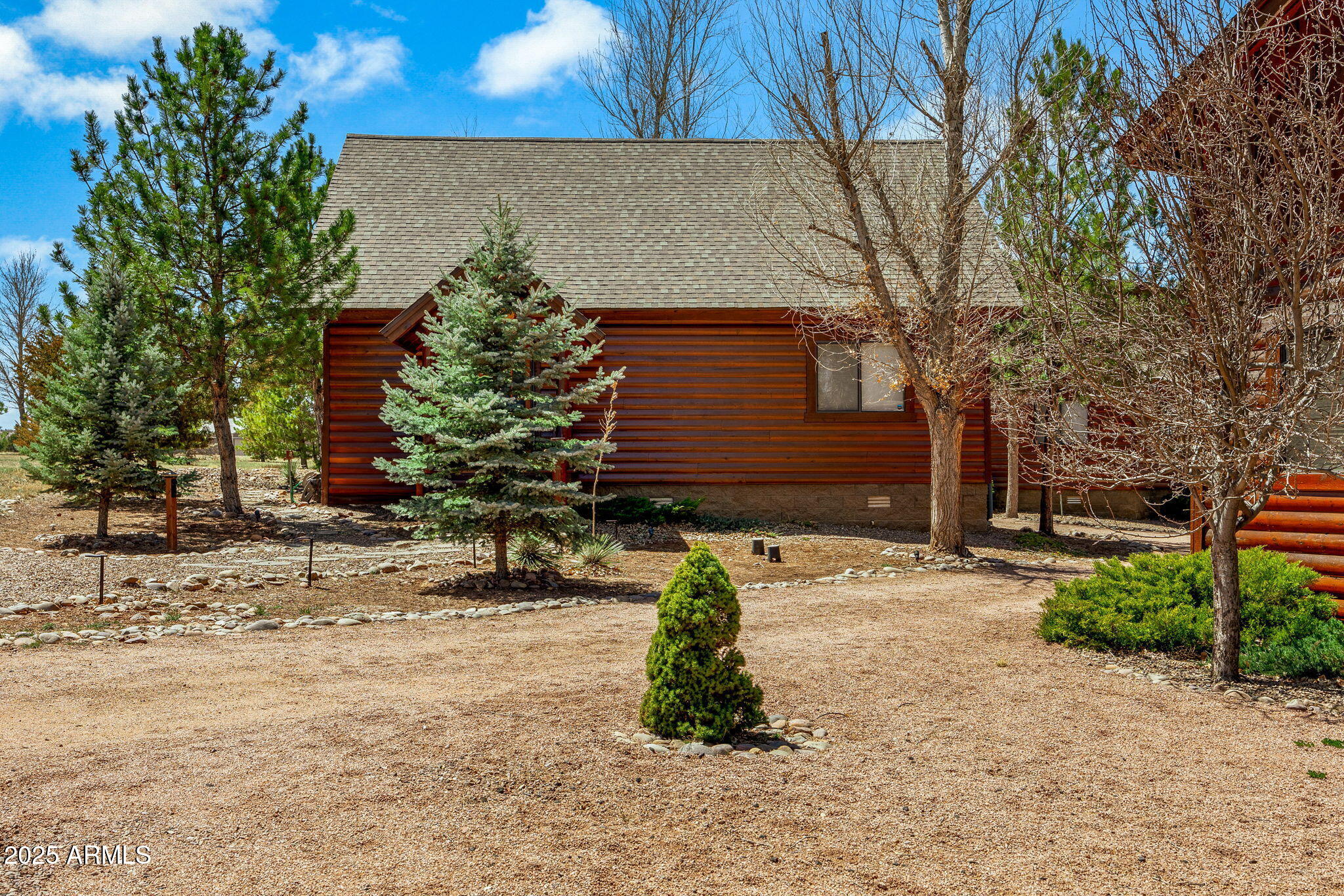 2300 Overgaard Springs Loop Overgaard, AZ 85933 - Photo 10 of 48 a view of a house with a yard