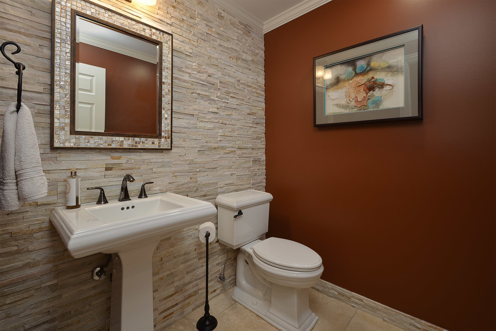 1866 West Tweed Road Inverness, IL 60067 - Photo 22 of 40 a bathroom with a toilet sink and mirror